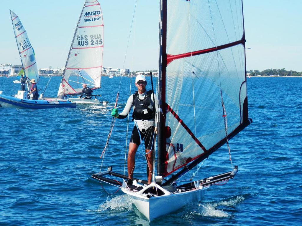 Change of scene – popular Fremantle Sailing Club Head Coach Arthur Brett took the opportunity to do some sailing himself in the challenging single-handed-with-trapeze-and-spinnaker Musto Skiff. © Annette Walker